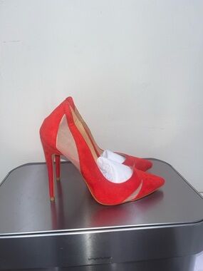 Red stiletto pumps